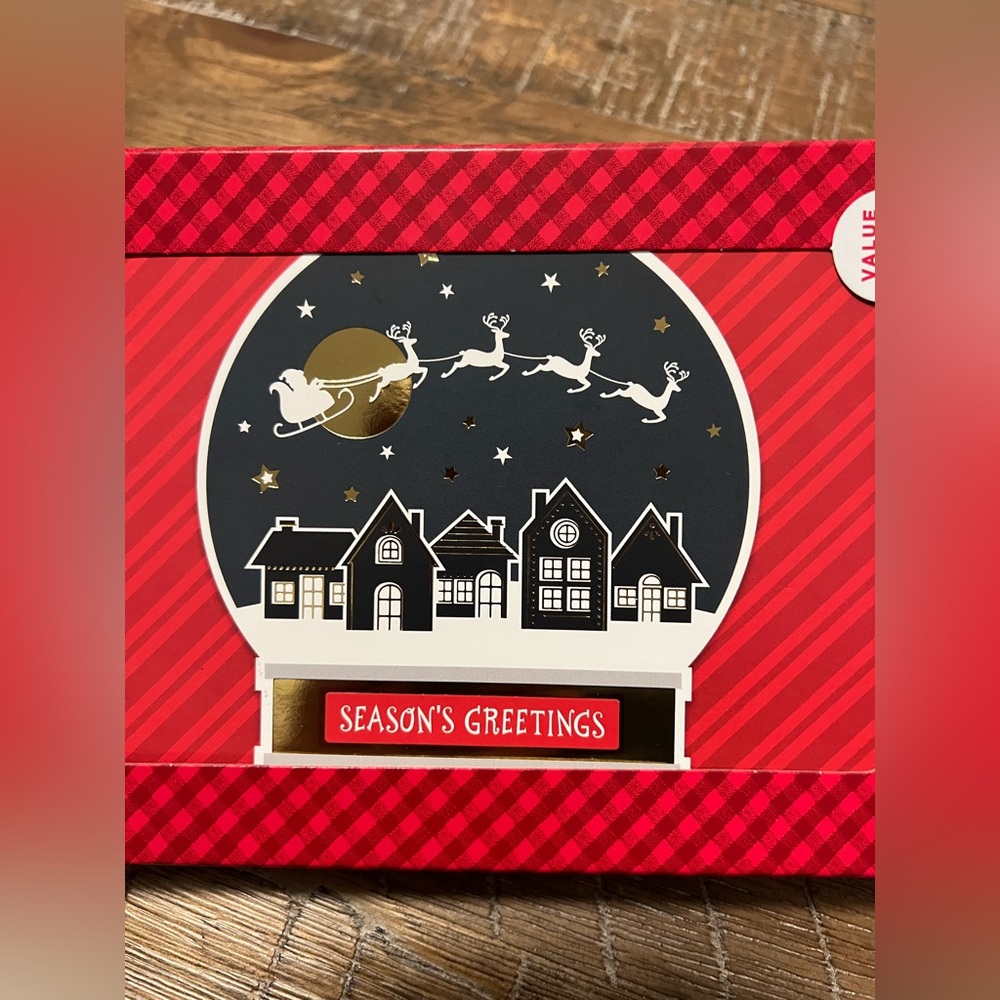 Hallmark Red and Gold Holiday Card with Snow Globe Design